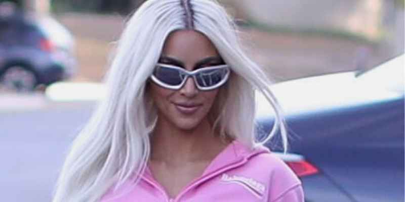Kim Kardashian Rocks In Pink Balenciaga Boot Leggings And A Cropped Sweater