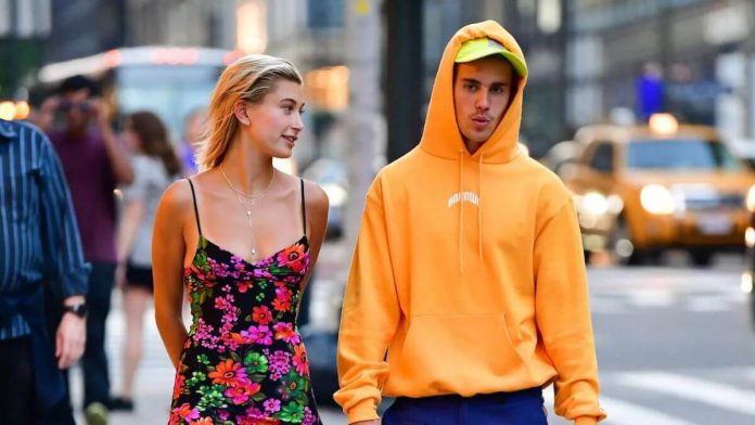 Justin Bieber kisses Wife Hailey After Experiencing Facial Paralysis